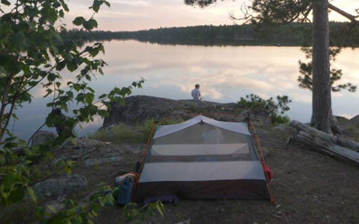 adult camping trip in boundary waters